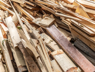 Heap of construction wooden debris close-up.